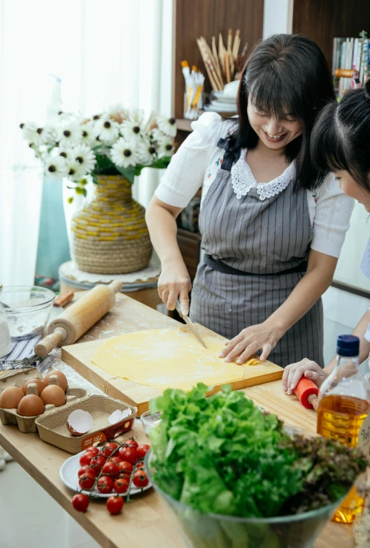 a group of women preparing food in a kitchen, a picture, inspired by Li Di, shutterstock, square, slide show, japanese, banner