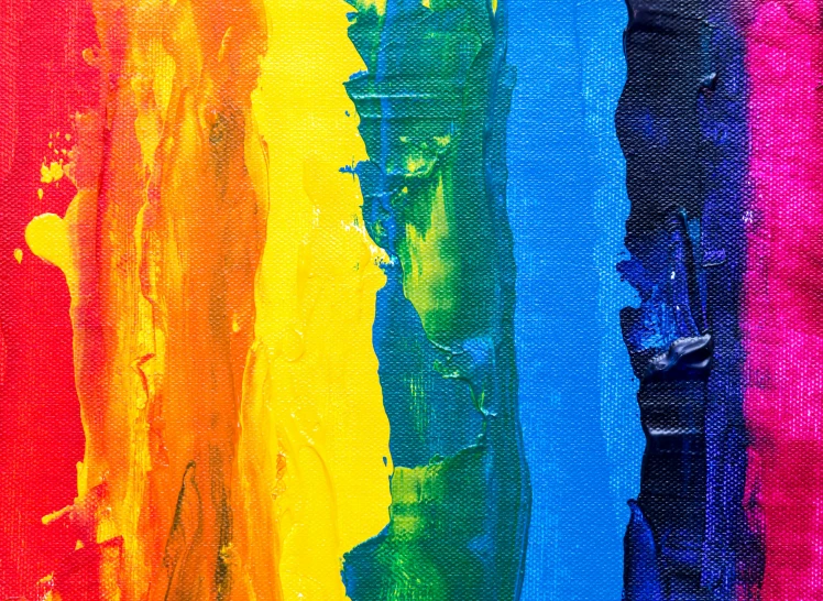 a painting with different colors of paint on it, inspired by Morris Louis, pexels contest winner, lgbt flag, yellow and blue, lesbian art, textured canvas