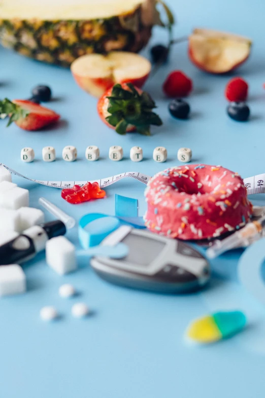 a pineapple sitting on top of a table next to a pile of pills, a still life, trending on pexels, happening, made out of sweets, red and blue color theme, anorexic figure, banner