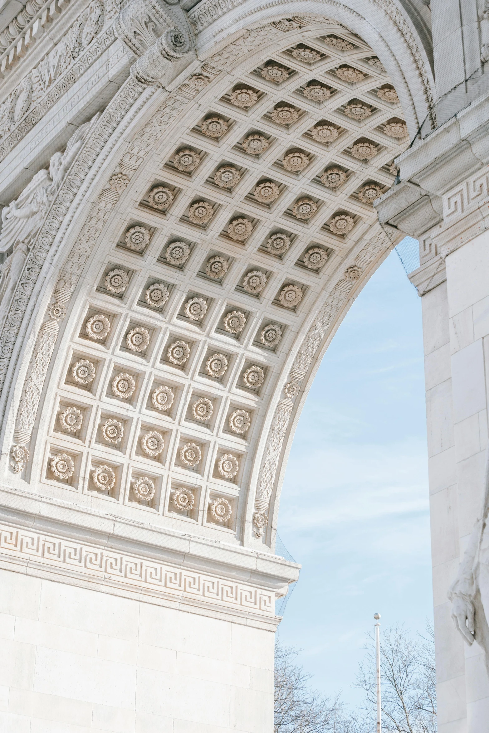 a couple of people that are standing in front of a arch, up-close, up close, marble statue, overhead canopy