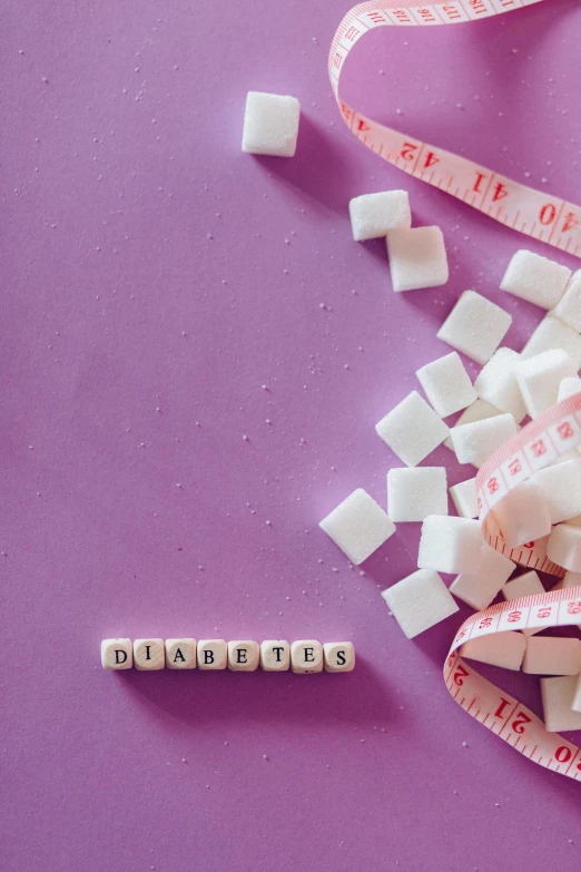 a pile of sugar cubes next to a measuring tape, by david rubín, trending on pexels, happening, pastel purple background, folds of belly flab, square, label