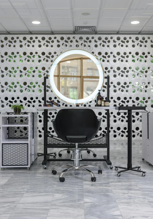 a chair sitting in front of a mirror in a room, sitting at a computer desk, black and silver, hairworks, circle design