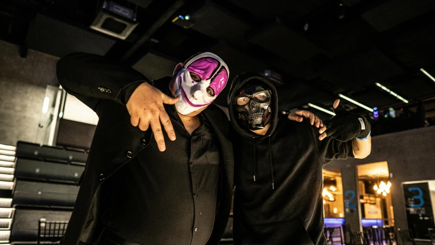 a couple of men standing next to each other, a portrait, unsplash, graffiti, masked person in corner, in a nightclub, wwe, avatar image