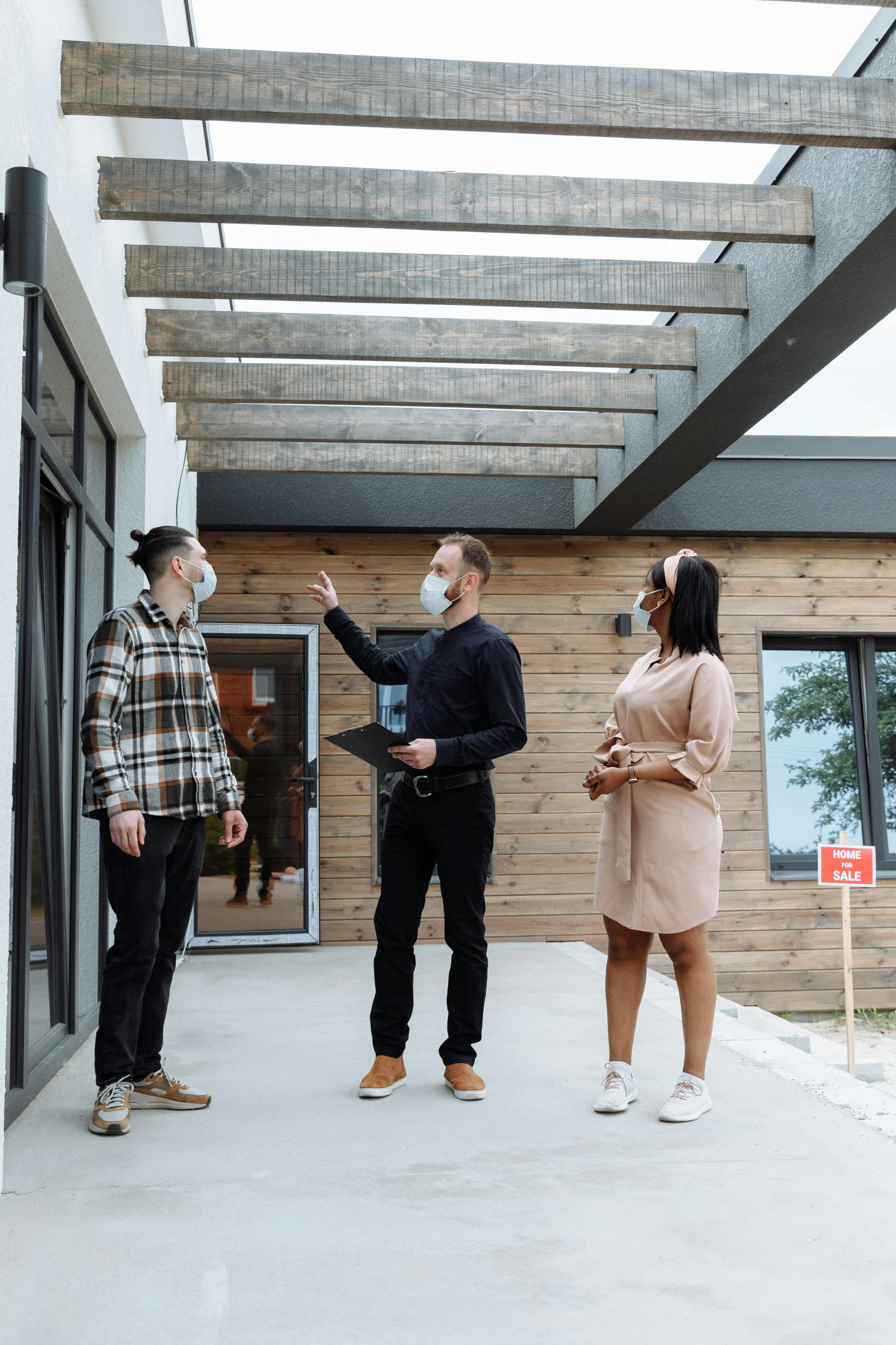 a group of people standing outside of a house, inspect in inventory image, hip modern vibe, thumbnail, construction