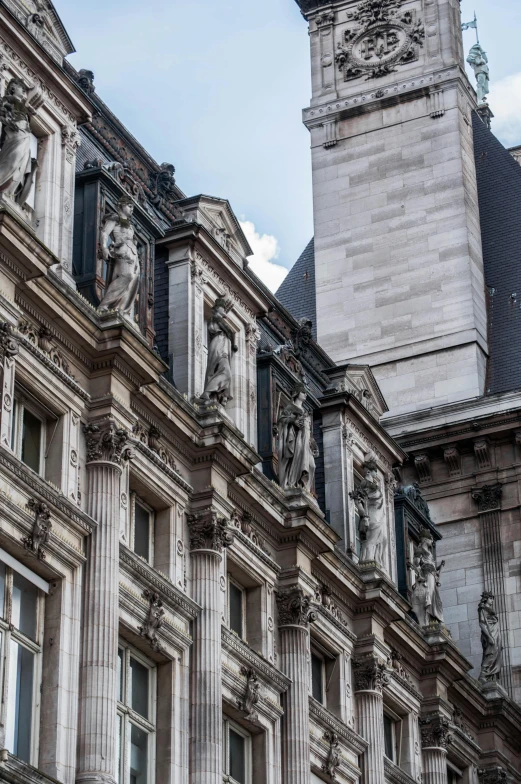 a clock that is on the side of a building, a statue, inspired by Hubert Robert, buttresses, vents, prefecture streets, high detail photograph