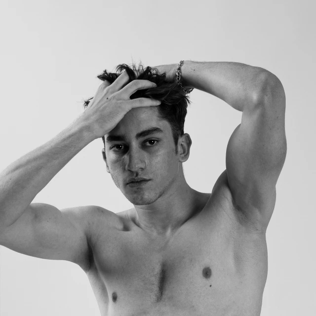 a black and white photo of a shirtless man, by Cosmo Alexander, pexels contest winner, realism, cai xukun, 'white background'!!!, bouguereau style pose, ash thorp khyzyl saleem