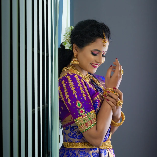 a woman in a purple and gold sari, inspired by T. K. Padmini, pexels contest winner, blue colored traditional wear, thumbnail, cute pose, square