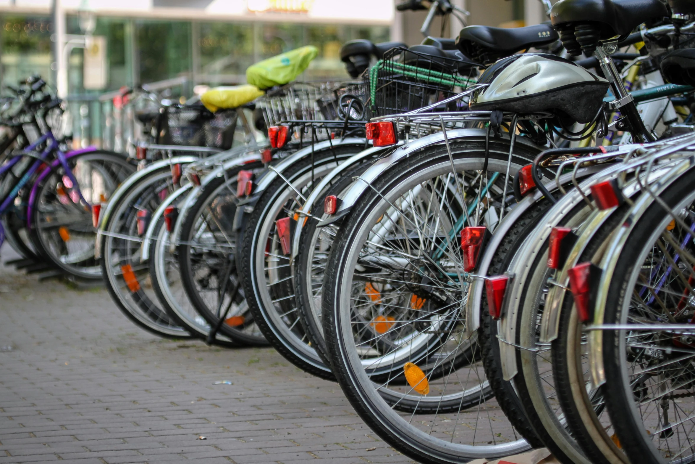a row of bicycles parked next to each other, pexels contest winner, avatar image, fan favorite, zoomed in, facebook post