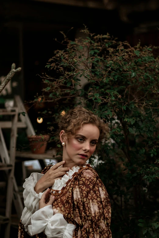 a woman in a dress standing in front of a tree, a portrait, inspired by Jean-Antoine Watteau, pexels contest winner, rococo, in the yard, emma watson portrait, square, wearing victorian rags