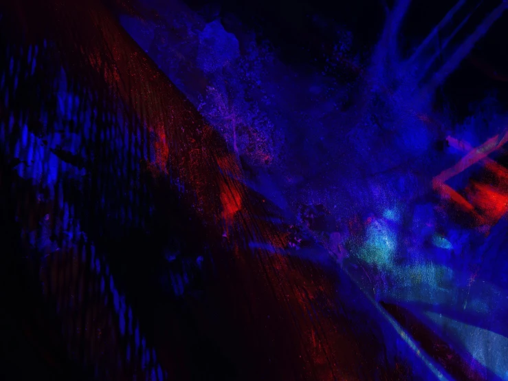 a blurry image of a tree with blue and red lights, an album cover, by Adam Marczyński, pexels contest winner, lyrical abstraction, handpaint texture, black light, purple and red, midnight