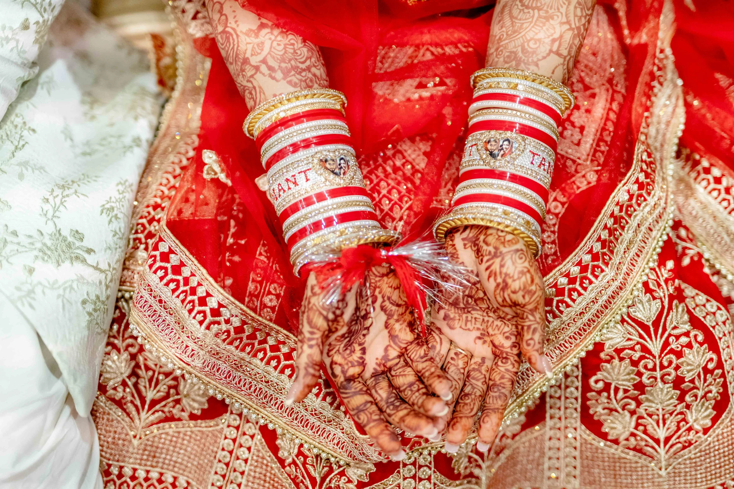 a close up of the hands of a bride, pexels, wearing red attire, thumbnail, desi, concerned