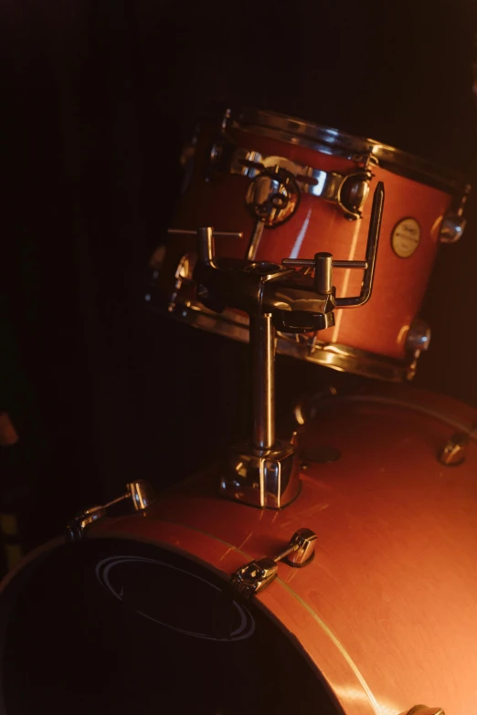 a close up of a drum on a stage, by David Simpson, photorealism, 15081959 21121991 01012000 4k