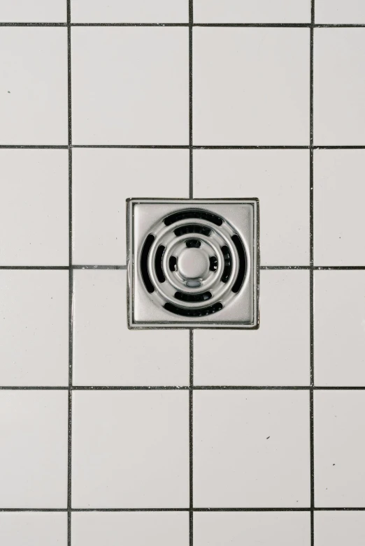 a black and white photo of a shower drain, an album cover, unsplash, conceptual art, square lines, 15081959 21121991 01012000 4k, m, enamel