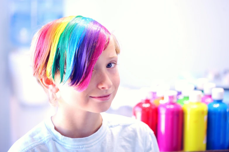 a close up of a person with colorful hair, young boy, experimenting in her science lab, fashionable haircut, rainbow colours