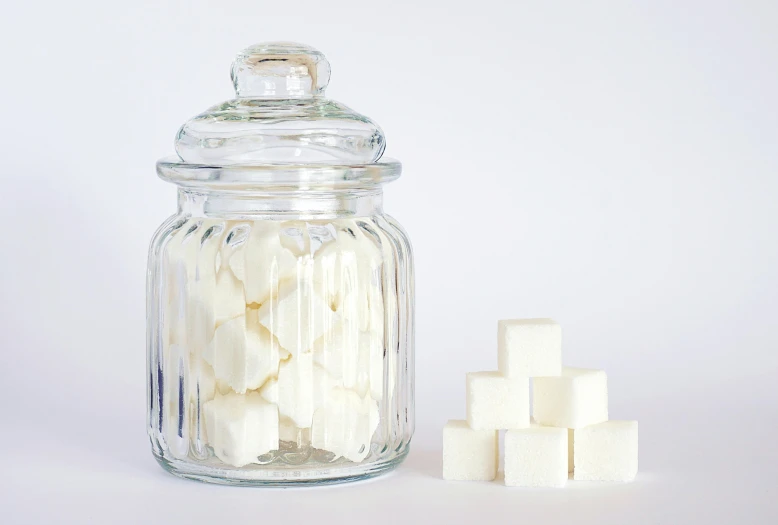 a glass jar filled with white sugar cubes, monaco, porcelain organic tissue, thumbnail, cake