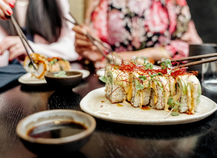 a close up of a plate of food with chopsticks, pexels contest winner, mingei, over the shoulder, daily specials, amanda lilleston, avatar image