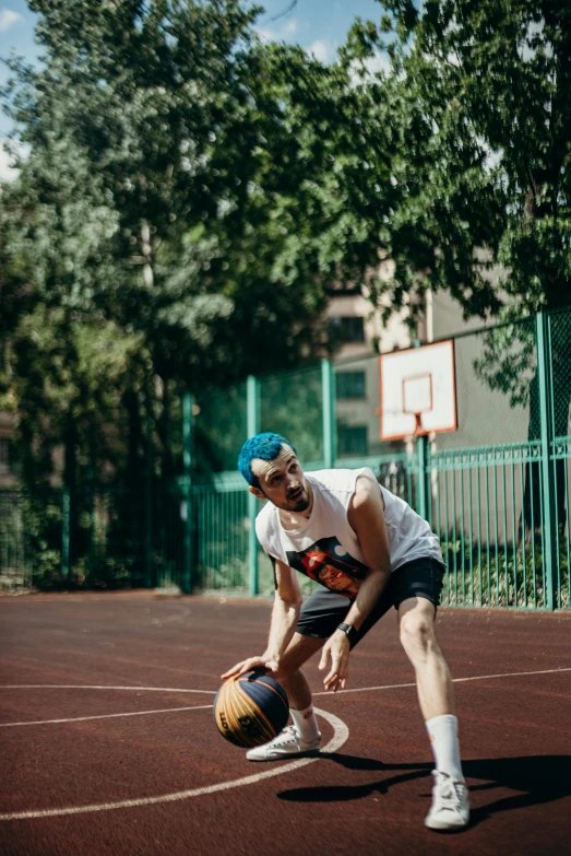 a man dribbling a basketball on a court, by Matija Jama, trending on dribble, with blue hair, asian male, in the yard, jacksepticeye