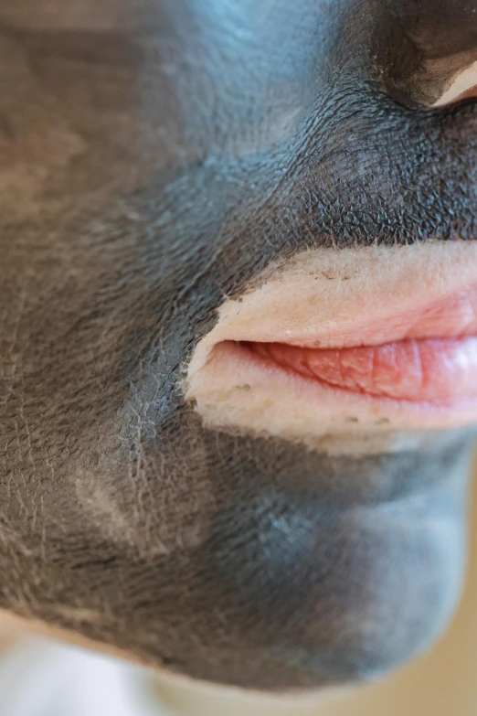 a close up of a person's face with a black mask on, a stipple, soft lulling tongue, anatomically correct equine, pale blue skin, pink lips