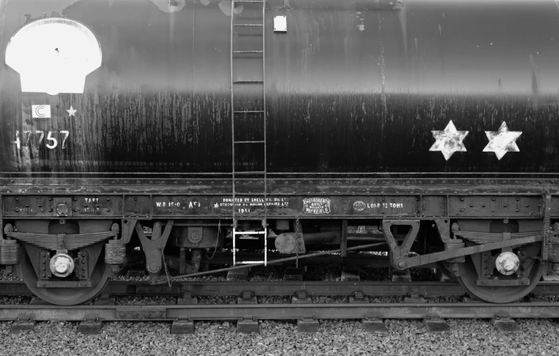 a black and white photo of a train car, a portrait, inspired by August Sander, flickr, watertank, portrait image, underbody, portrait n - 9