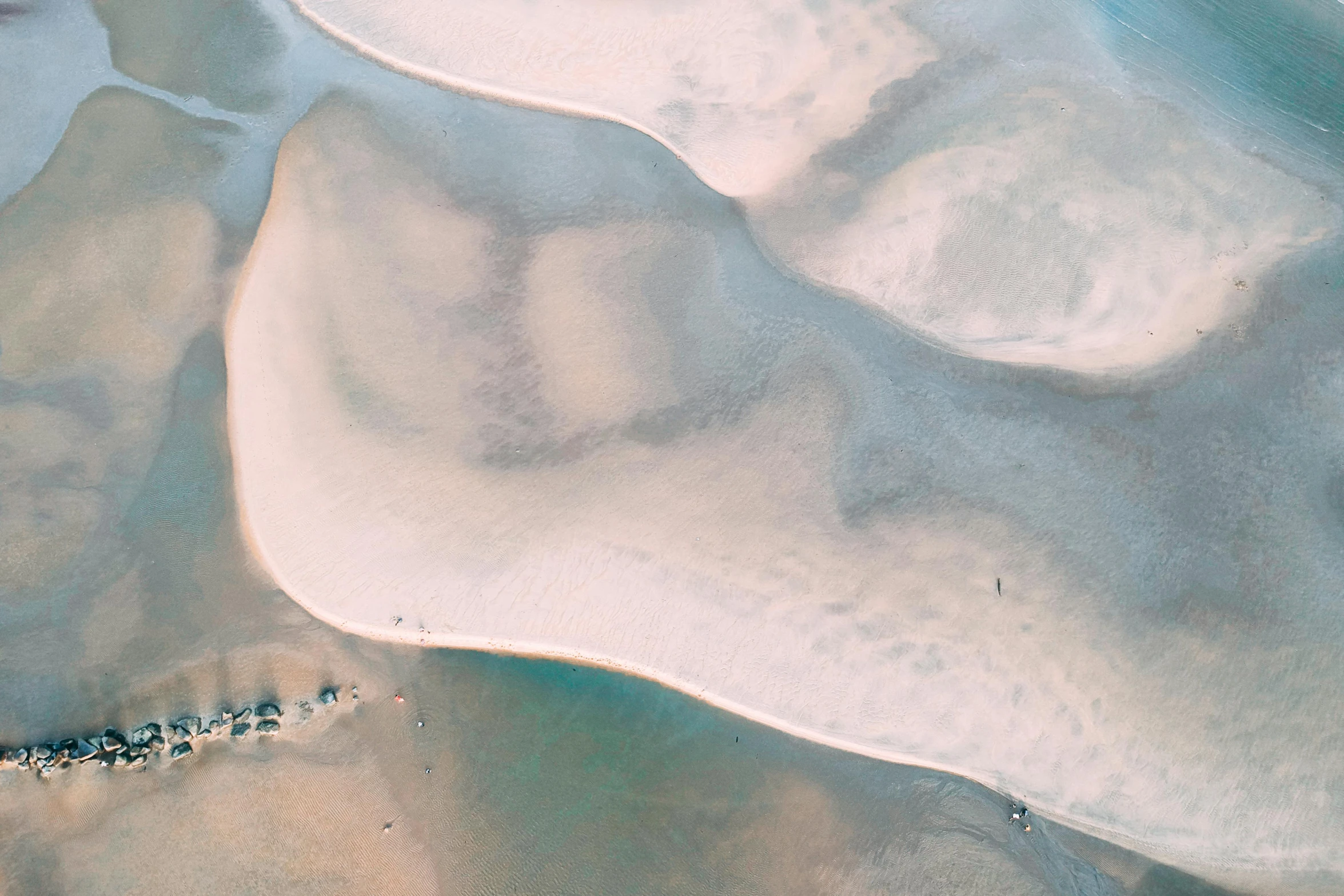 a group of people standing on top of a sandy beach, unsplash contest winner, minimalism, winding rivers, abstract white fluid, australian beach, inlets