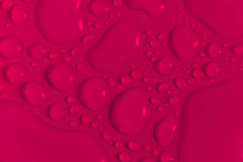 a close up of water droplets on a pink surface, a raytraced image, trending on zbrush central, plasticien, raspberry banana color, seamless fabric pattern 8k, red paint detail, 4 0 9 6