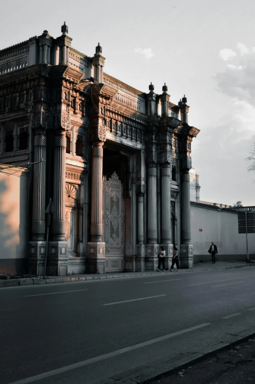 a black and white photo of an old building, by Tamas Galambos, pexels contest winner, baroque, golden gates, color image, turkish and russian, taken at golden hour