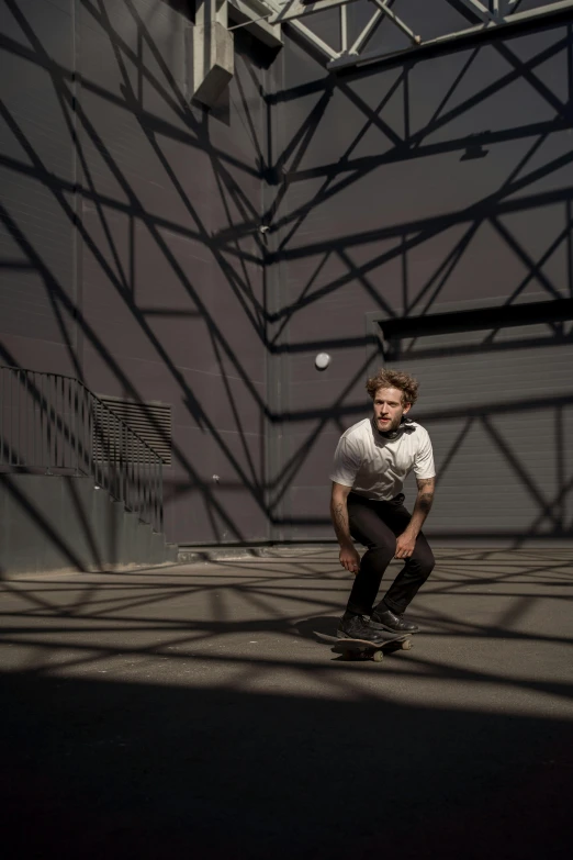 a man riding a skateboard on top of a cement floor, inspired by Seb McKinnon, motion lines, looking confident, jay bauman, glowing