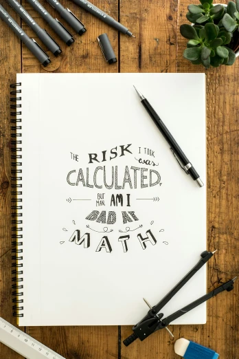 a notebook sitting on top of a wooden table, analytical art, math inspired, lettering, 1 6 x 1 6, teaser