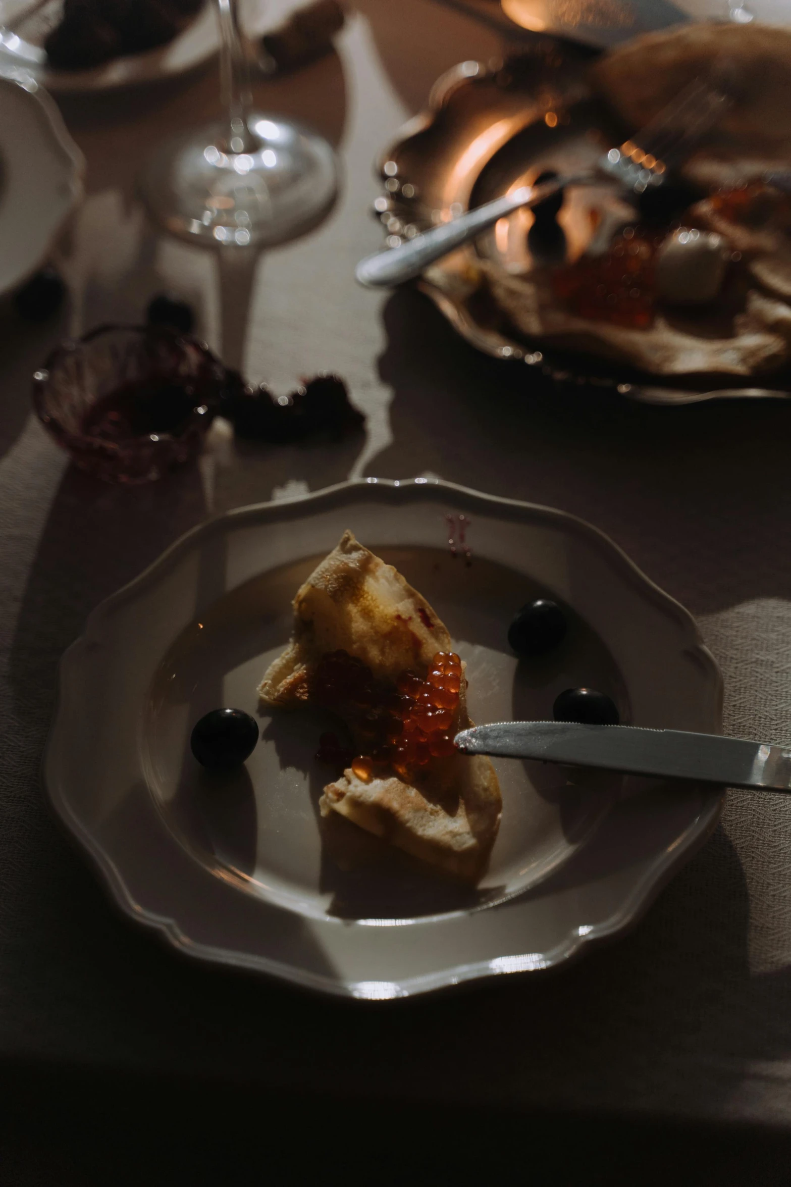 a close up of a plate of food on a table, by Alexis Grimou, cinematic masterpiece, marmalade, ignant, russian