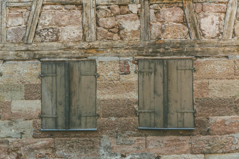 a red fire hydrant sitting in front of a stone building, an album cover, inspired by William Nicholson, unsplash, renaissance, rustic wood, windows and walls :5, panels, brown