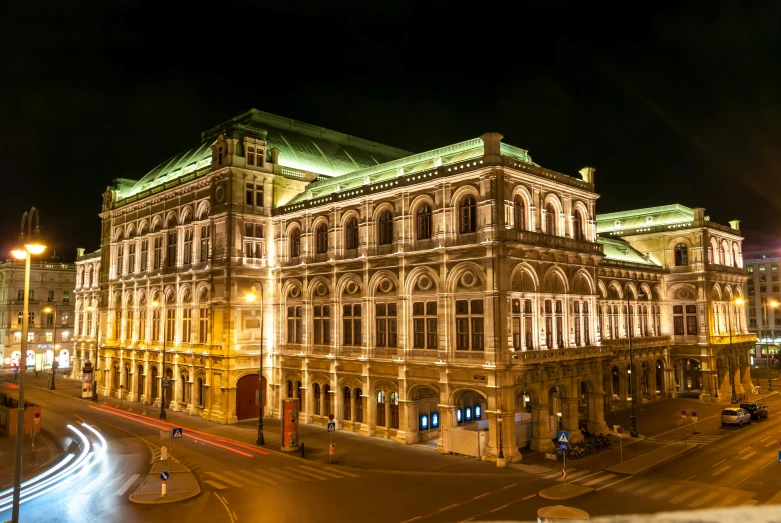 a large building is lit up at night, inspired by Mihály Munkácsy, vienna state opera house, slide show, profile image, square