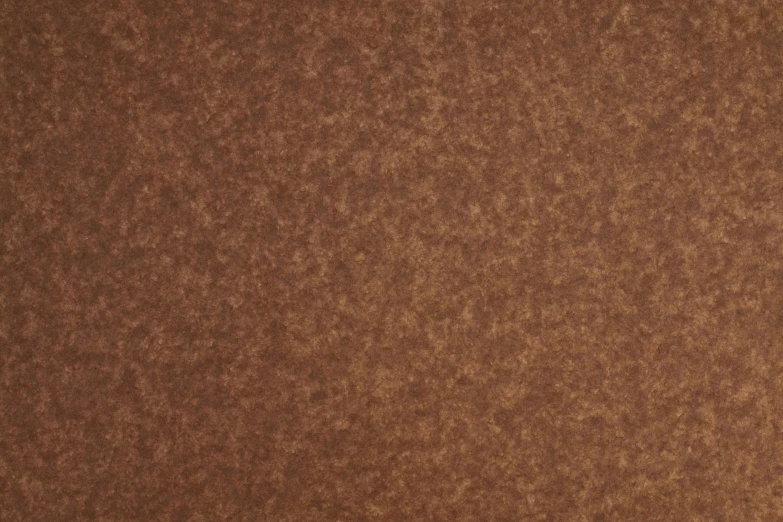 a close up of a brown leather surface, detailed product image, clear [bronze] face, detailed product shot, soft shade