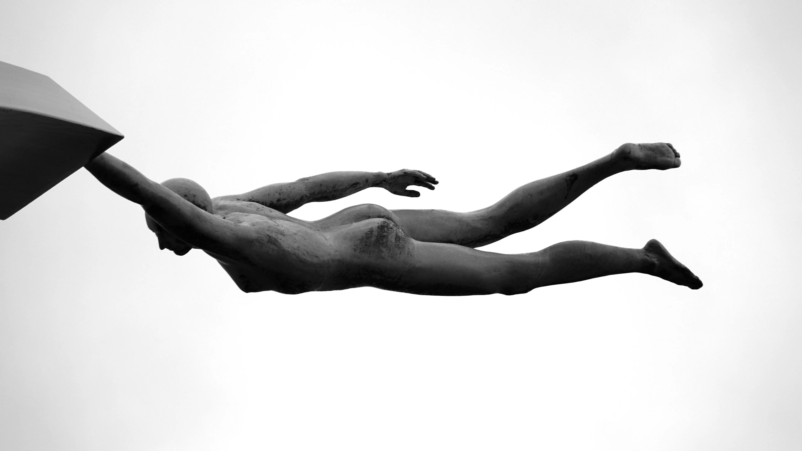a statue of a man holding an umbrella, a statue, inspired by Herb Ritts, pexels contest winner, figurative art, olympic diving springoard, flying whale, abstract human body, lying on an abstract
