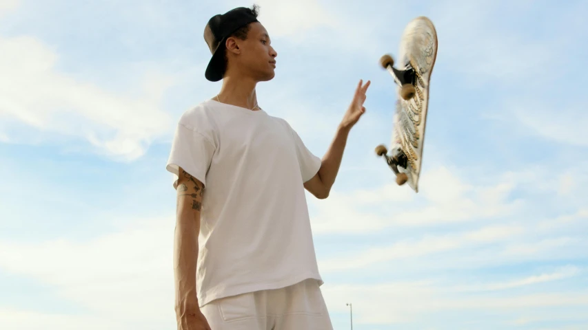 a man tossing a skateboard in the air, by Carey Morris, pexels contest winner, realism, uniform off - white sky, avatar image, white, contemplating