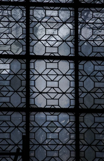 a view of the sky through a stained glass window, inspired by Ai Weiwei, arabesque, grisaille, ( geometric ), tehran, up-close