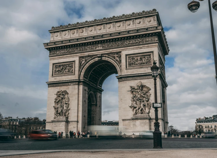 a very tall arch sitting on the side of a road, pexels contest winner, neoclassicism, in nazi occupied france, square, brown, grey