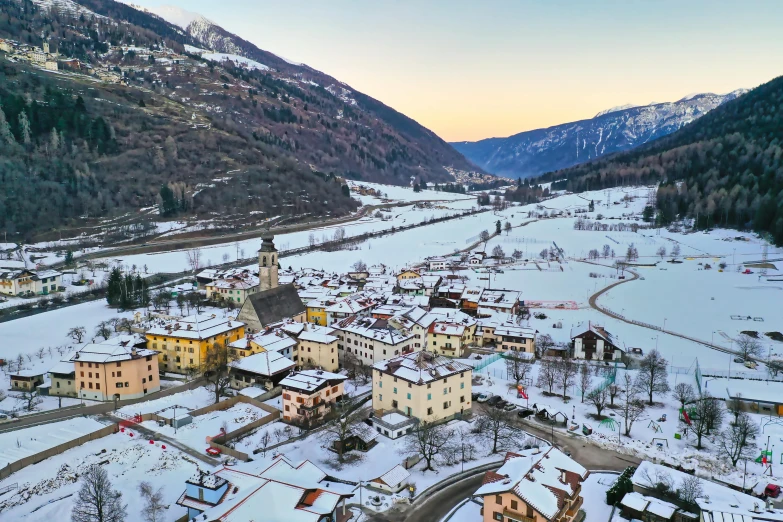 a village in the mountains covered in snow, pexels contest winner, square, overlooking river aufidius italy, aerial, thumbnail