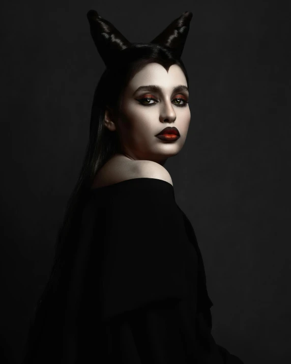 a woman with horns on her head, by Lucia Peka, trending on pexels, gothic art, kat dennings, beautiful taissa farmiga, kylie jenner as catwoman, non binary model