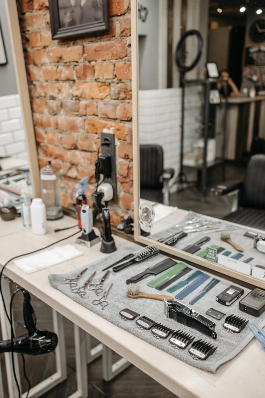 a table topped with lots of tools on top of a wooden table, modern haircut, thumbnail, abcdefghijklmnopqrstuvwxyz, collection product