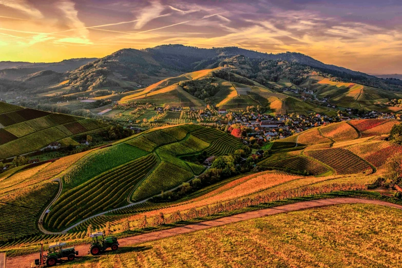 a truck driving down a road next to a lush green hillside, a digital rendering, by Jakob Gauermann, pexels contest winner, renaissance, sunset in a valley, wine, wide view of a farm, slovenian