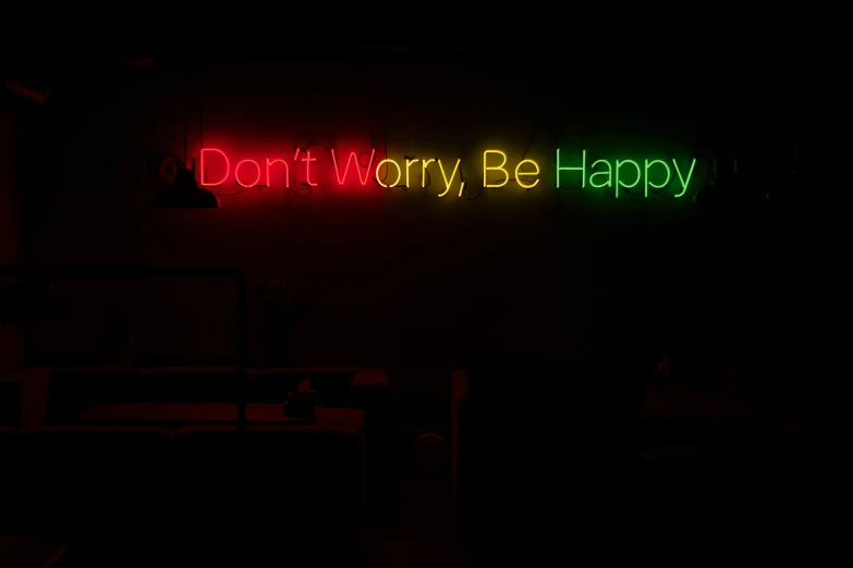 a neon sign that says don't worry be happy, an album cover, inspired by Bruce Nauman, pexels, dark hazy room, multi - coloured, black, bl