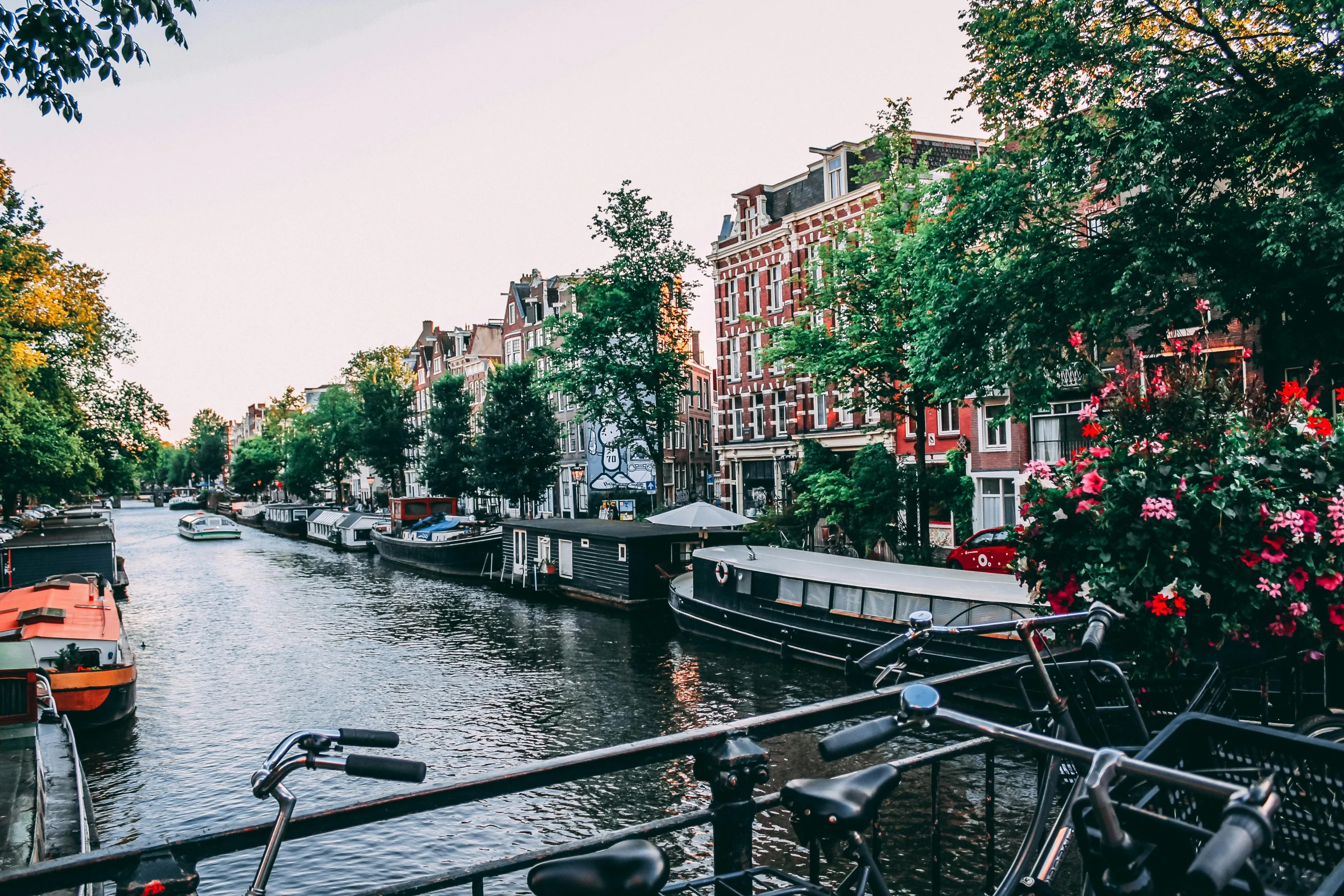 bicycles are parked on a bridge over a canal, pexels contest winner, happening, dutch houses along a river, 🚿🗝📝