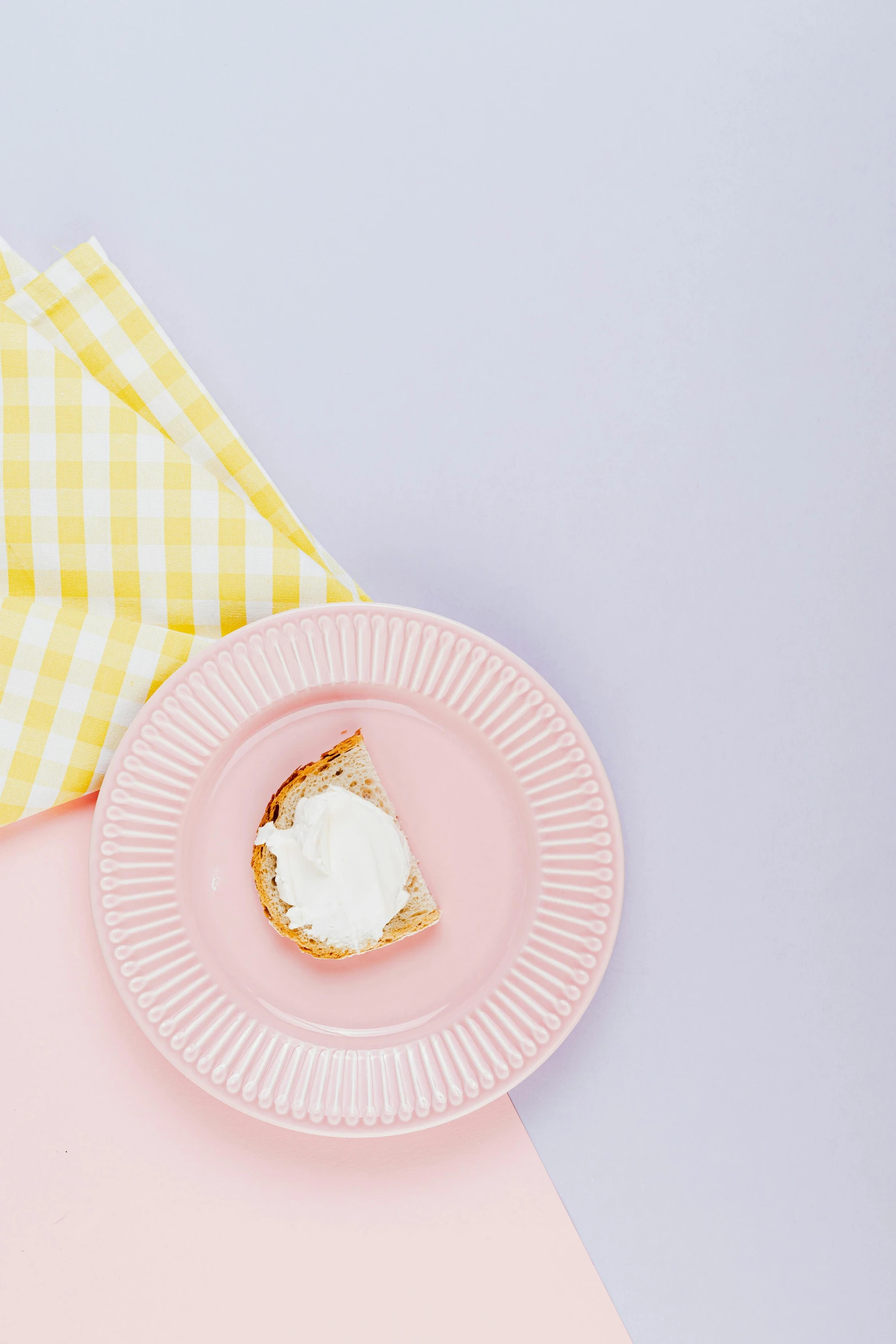 a pink plate with a piece of cake on it, trending on unsplash, magic realism, white and yellow scheme, background image, ruffled fabric, toast