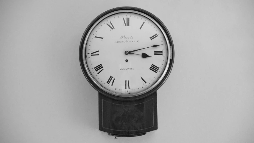 a black and white photo of a clock with roman numerals, by Michael Gustavius Payne, 1825-1829, spectacles, ƒ/3.5, battery