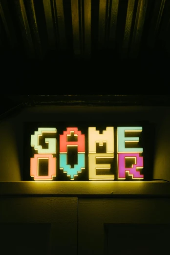 a neon sign is lit up in the dark, an album cover, by Sara Saftleven, graffiti, retro games, when it's over, gamer, 2 0 1 0 s