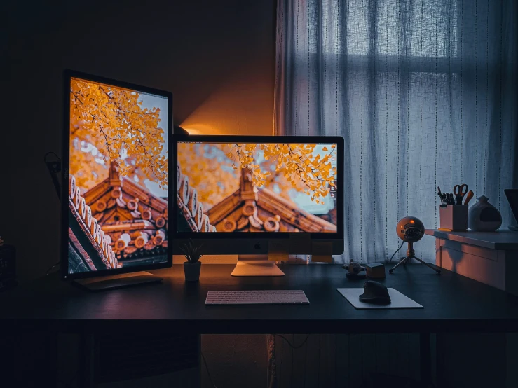 two computer monitors sitting on top of a desk, inspired by Kanō Hōgai, unsplash contest winner, evening lighting, stunningly detailed, home display, many screens