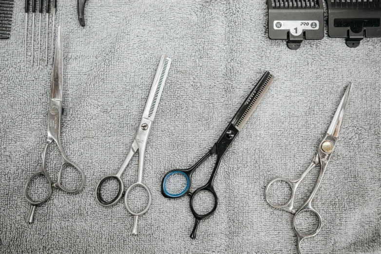 a bunch of different types of scissors and combs, by Matija Jama, trending on pexels, grey beard, circular, floggers, medical equipment