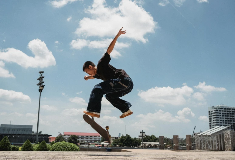 a man flying through the air while riding a skateboard, pexels contest winner, hyperrealism, man standing in defensive pose, in style of thawan duchanee, beautiful weather, 15081959 21121991 01012000 4k