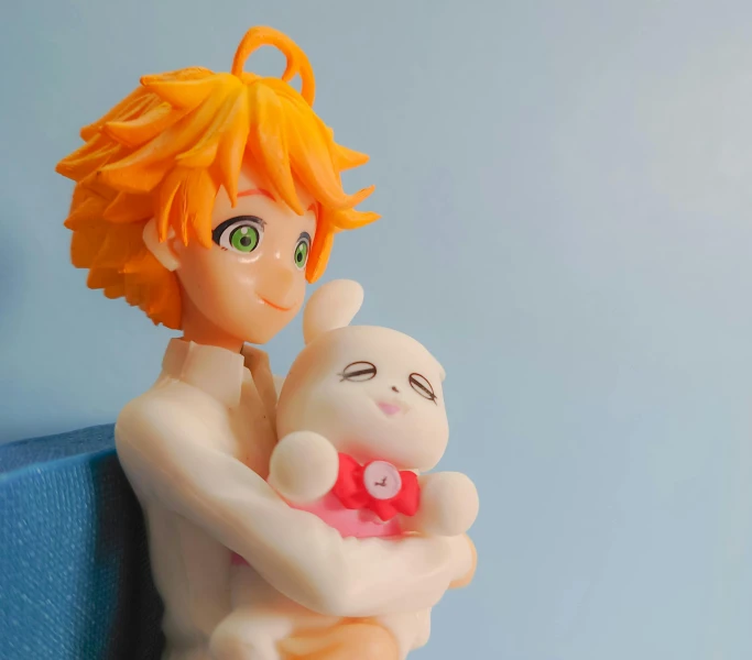 a figurine of a woman holding a baby, an album cover, inspired by Inoue Naohisa, pexels, orange - haired anime boy, ichigo kurosaki, cute! c4d, plushie