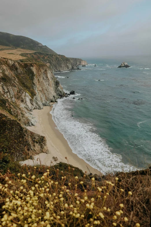 a large body of water next to a sandy beach, by Kristin Nelson, pexels contest winner, renaissance, coastal cliffs, 2 5 6 x 2 5 6 pixels, pch, conde nast traveler photo